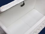 Classic wicker blanket chest inside view.